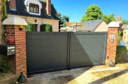 Quel artisan contacter pour une porte de garage motorisée  